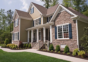 House with front landscaped and lush green grass