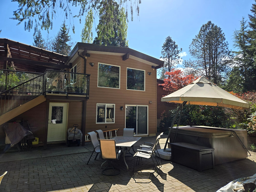 Backyard patio of a home for sale in Black Creek BC.