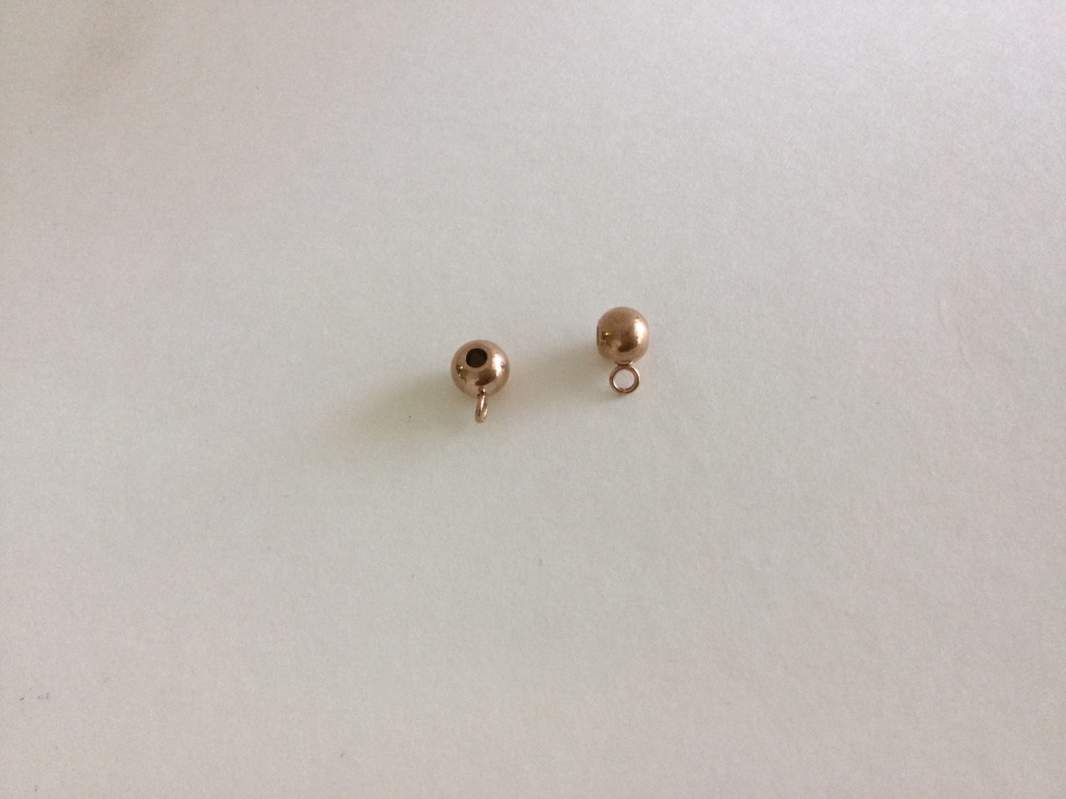 Charm holder 6mm stainless steel rose gold, is sold by 6 or 30 pieces.