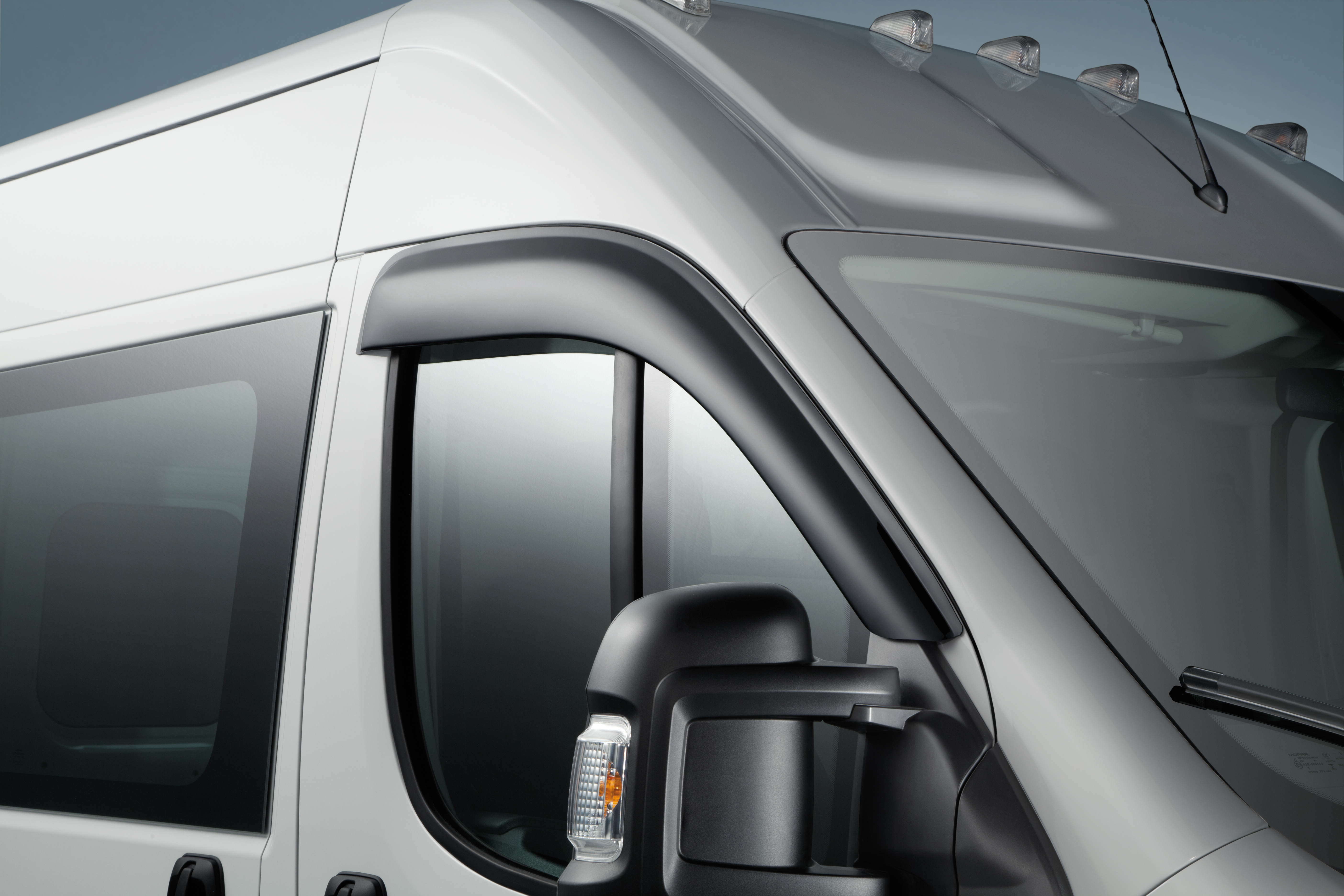 Side window air deflectors