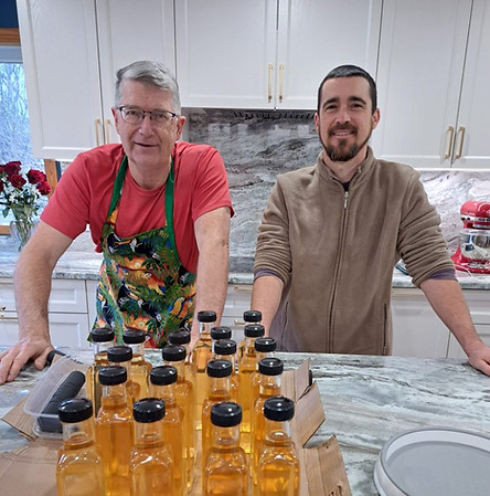 Jeff and Ian with bottle aged apple cider vinegar from St Eugène Vinegar