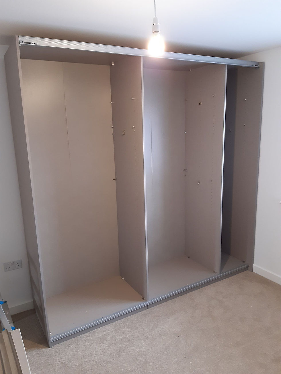 Dismantle and rebuild wardrobe A.M Flat Pack