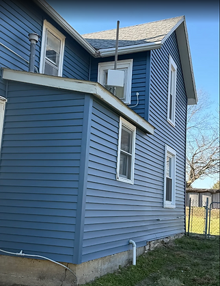New vinyl siding on old farmhouse makes the whole house look brand new in Topeka, KS