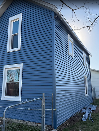 New siding on old farmhouse makes it look brand new in Topeka, KS