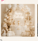 Elegant neutral birthday balloon decor with custom backdrop in Florida.