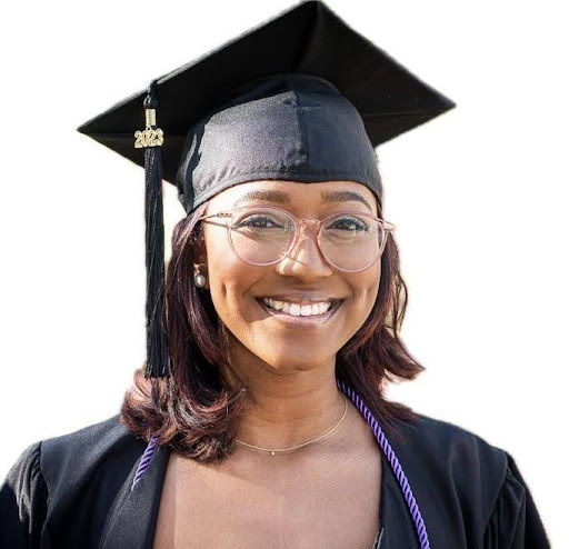 Headshot of Jada Nimblett from the shoulders up smiling in graduation attire.