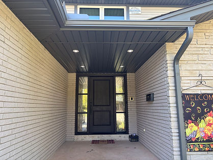 After photos of soffit & fascia installed with spotlights