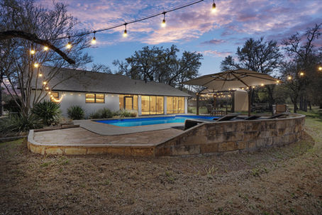 Tranquil pool at night with lighting