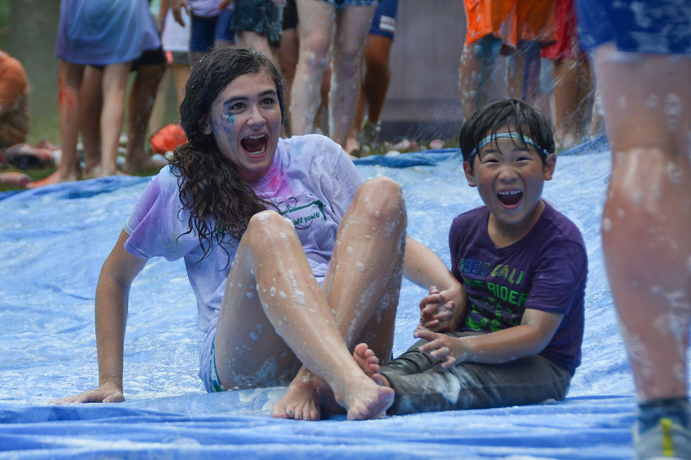 Teen and Junior on slip and slide