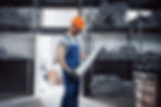 portrait-young-worker-hard-hat-large-metalworking-plant.jpg