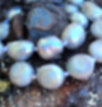 Tahitian black pearl necklace close-up. The Siren's Embrace by Pirate Jewelry Co. on display.