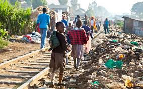 Ethically Evaluative Photo:
This photo shows families in Africa and you can see the trash on the ground. This photo provides a little bit of insight of what it may be like as a child in Africa.