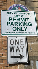 Descriptive:
This photo of signs on main street is descriptive because its purpose is to warn drivers.