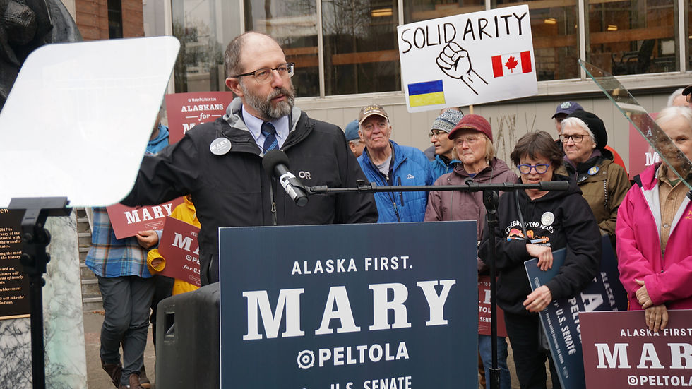 Sen. Jesse Kiehl, D-Juneau, speaks at a campaign rally for Mary Peltola in front of Dimond Courthouse on Thursday, May 14, 2026. (Ellie Ruel / Juneau Independent)