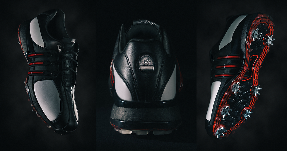 Adidas TOUR360 20th Anniversary golf shoe. Premium black and white leather with red striping, a classic silhouette, and a redesigned 7-spike outsole for power and stability.