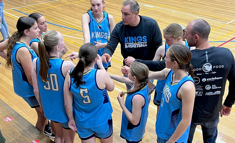 Girls with coach.jpg