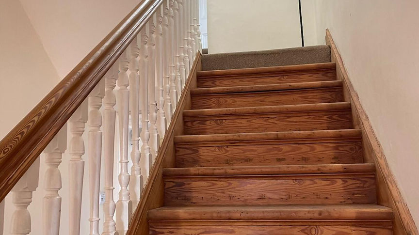 Freshly sanded wooden staircase