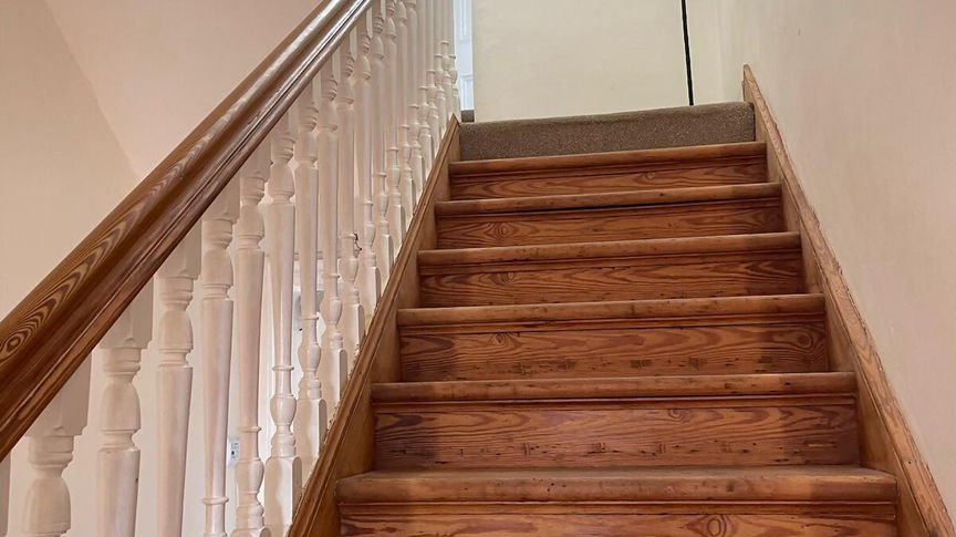 Freshly sanded wooden staircase