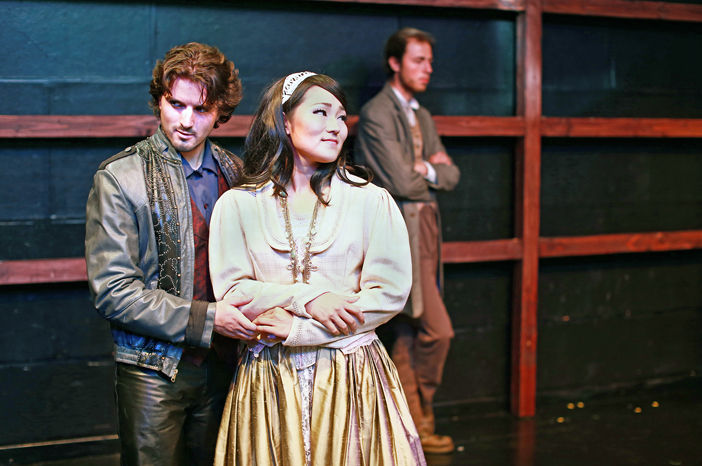 As Horatio (David Flack) broods behind, Hamlet (Josh Bross) confides in Ophelia (Alpha Takahashi), in a new theater project at the OC-centric play festival, running through Sunday at Chapman University. (Photo by Kazuya Kimura)