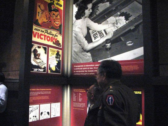 The exhibition included anti-Japanese propaganda posters that reinforced racial stereotypes.