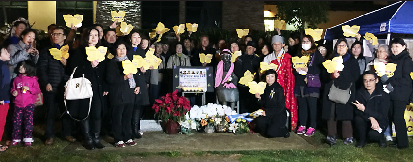 NCRR (photo right: Janice Yen, Patty Nagano, Haru Kuromiya, David Monkawa, Kathy Masaoka) sent a delegation on Jan. 5 to a candlelight vigil at the Glendale statue of a "comfort woman" sponsored by the Korean American Forum of California (KAFC) and the NabiFund to remember those who have passed away and to express support for their continued campaign for a direct apology and redress from the Japanese government for all "comfort women."