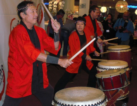 Tom Kurai (left) led a performance by Taiko Center of Los Angeles.