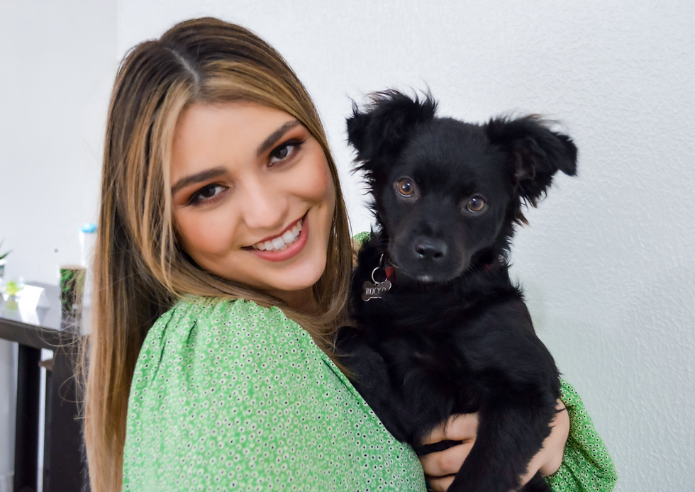 Alma holding her dog - Zventus