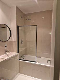 Bathroom renovation bespoke home decor London builder tiling bathroom installation
