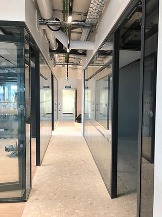 Elegant glass partitions for modern office spaces