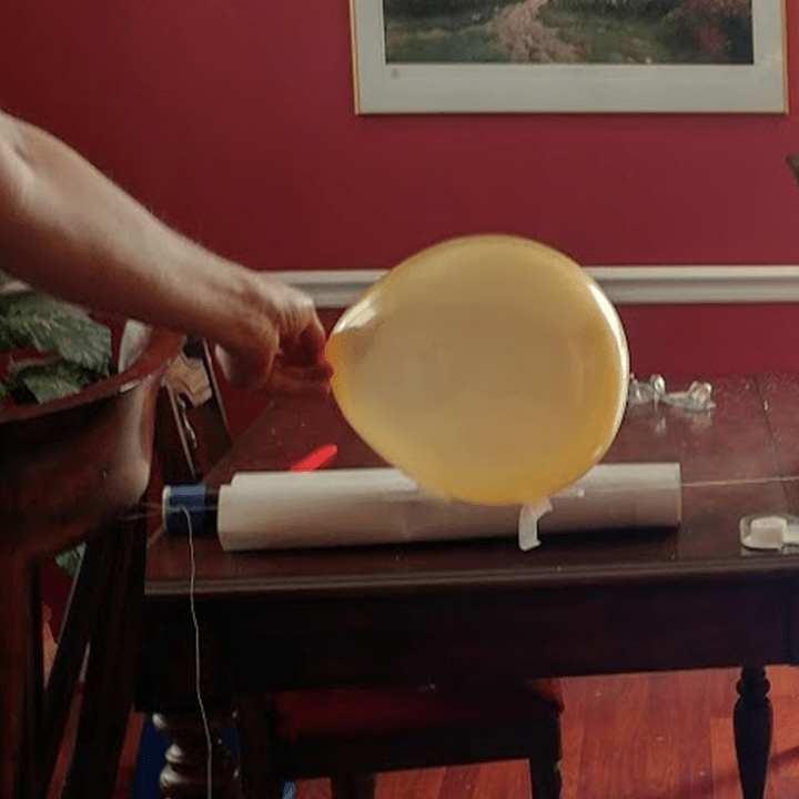 Balloon as a rocket on a string