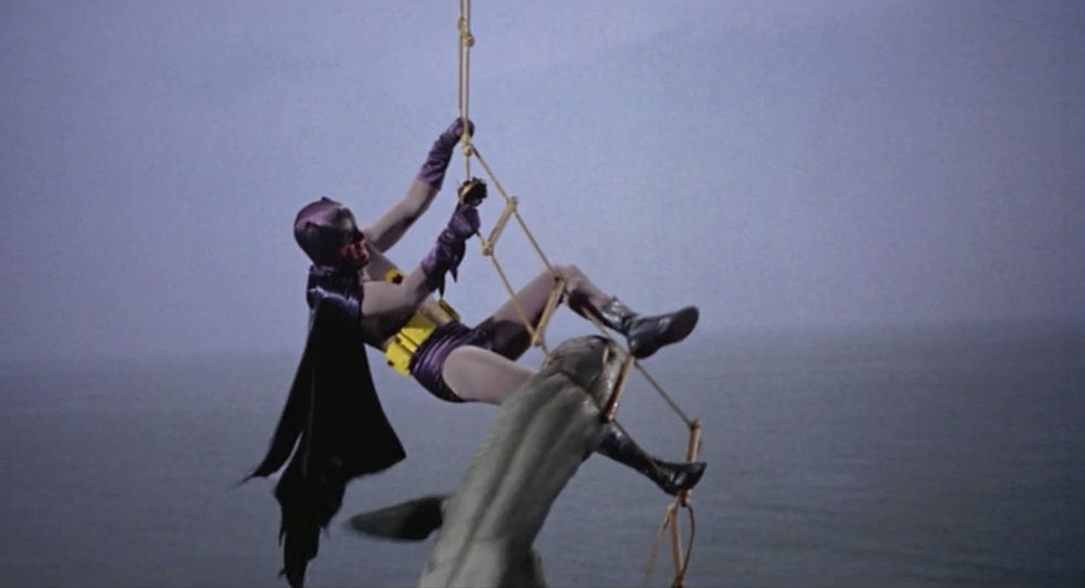 Adam West as Batman