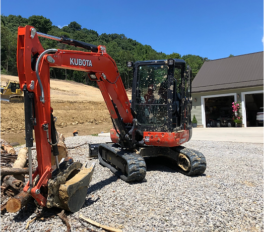 excavator in driveway