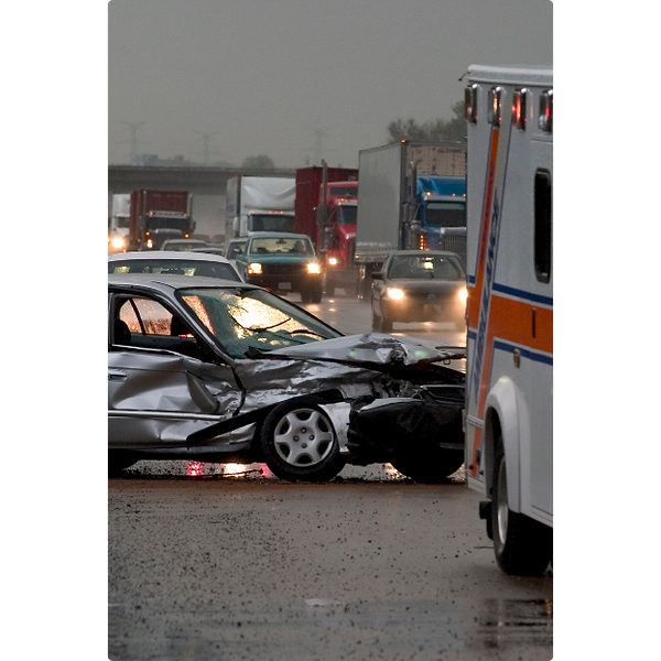 woman checking on damage of her car