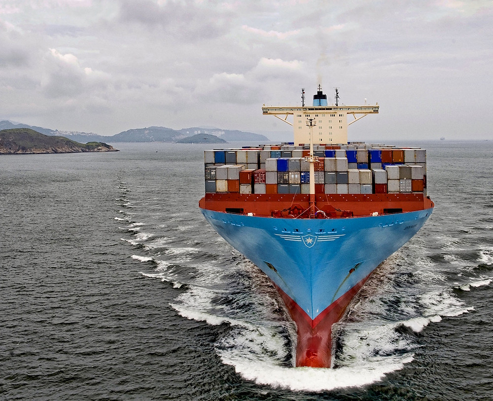 Maersk containership on the ocean heading toward the camera
