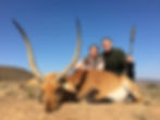 red lechwe hunting in africa