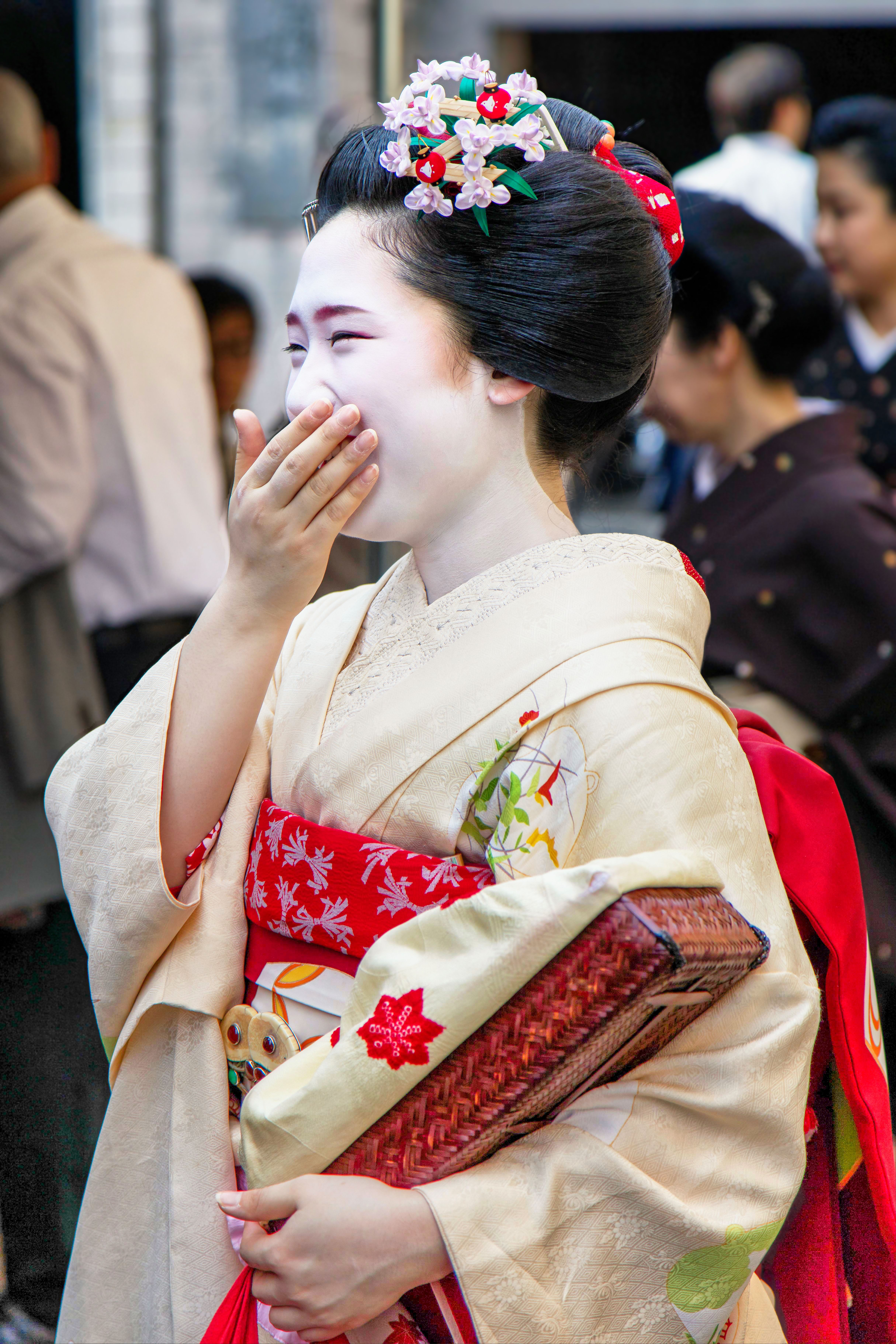 A smiling festival participant in traditional Japanese dress
