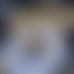 two kids having a sunny picnic on a beautiful petiotes floral print picnic blanket