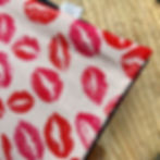 Close-up of red lips print cotton picnic blanket with waterproof lining
