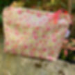 Petiotes floral wash bag in durable coated Liberty print fabric with yellow and pink meadow flowers