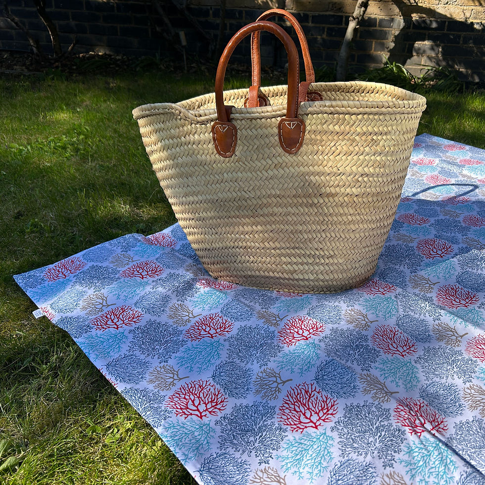 Thumbnail: Multicolour print picnic blanket outdoor setting with wicker basket - Coral patterned print by Petiotes London