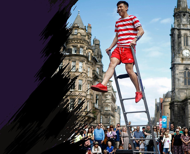 Jonathan Goh performing Planks & Ladders at Edinburgh Fringe Street Events