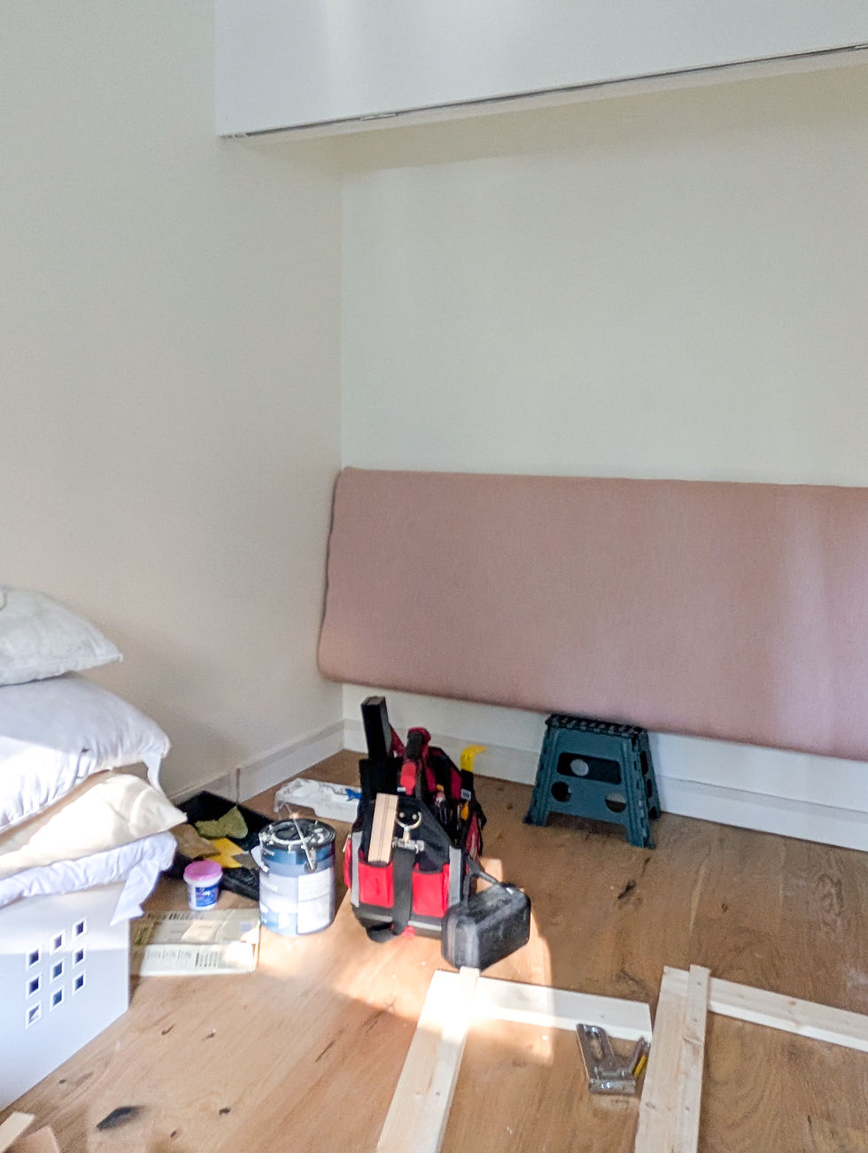 headboard for softness inside the closet that is going to be the bed