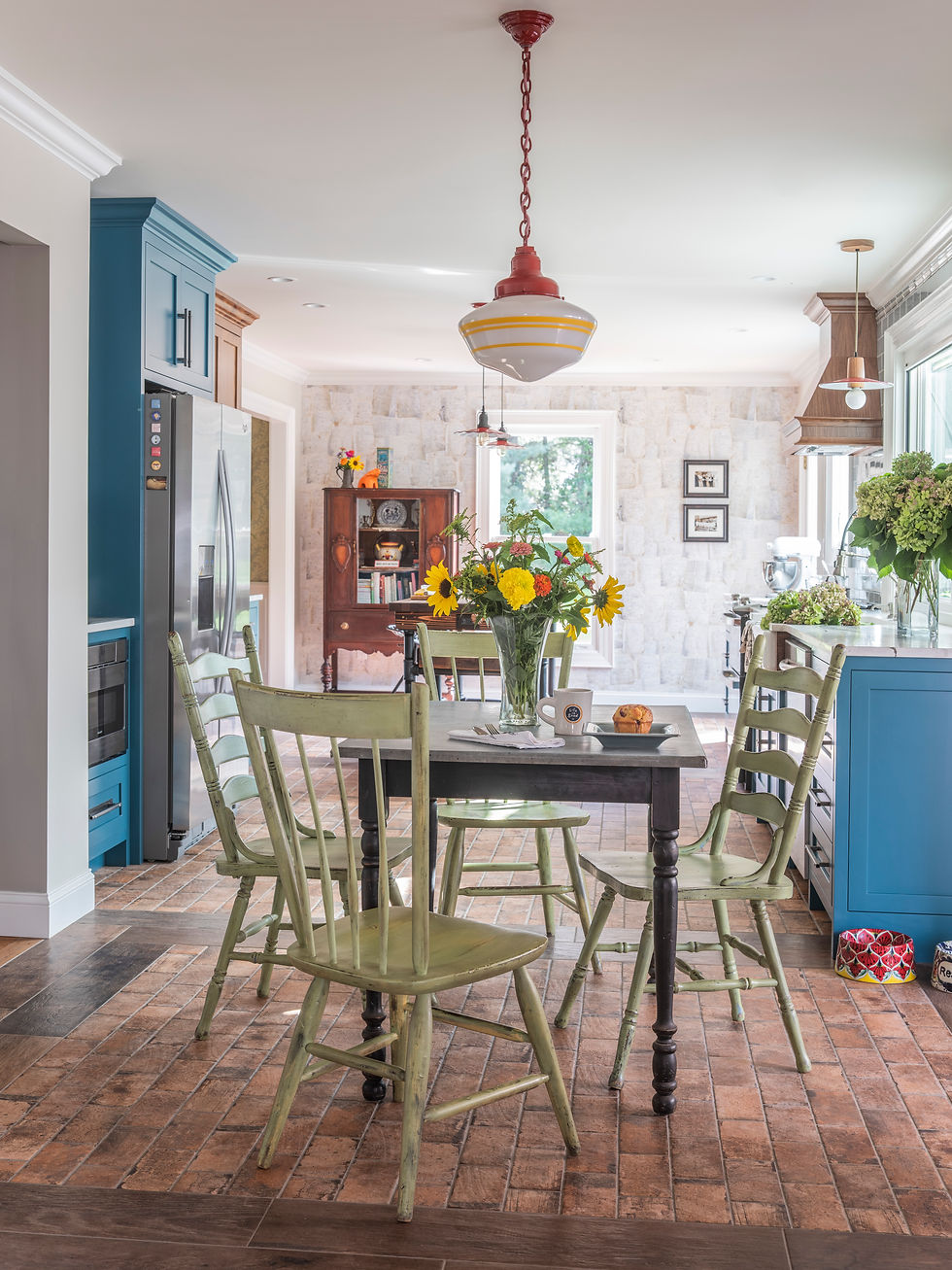 brick tile floor in teal kitchen