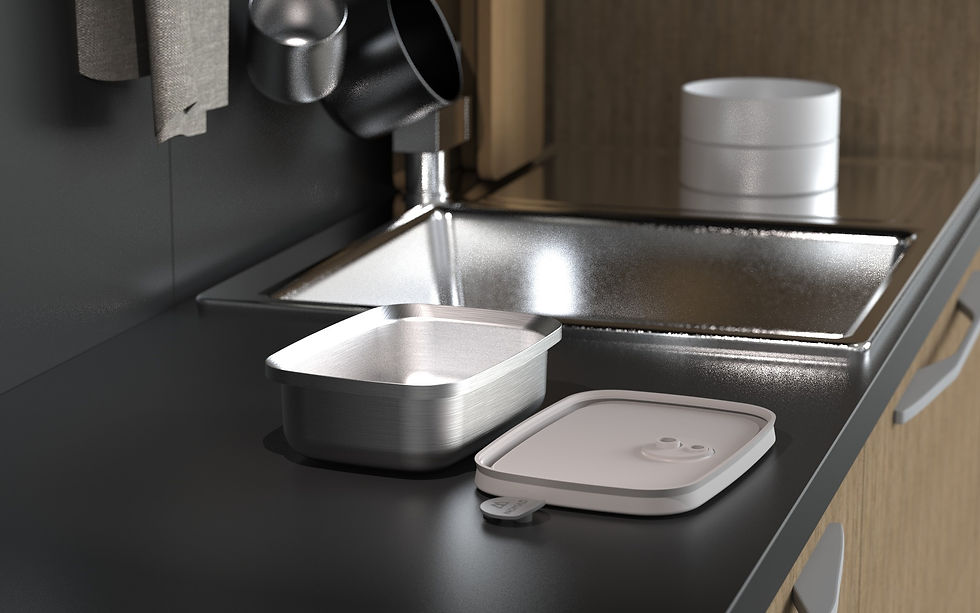 Clean recycles stainless steel launch box on the sink.