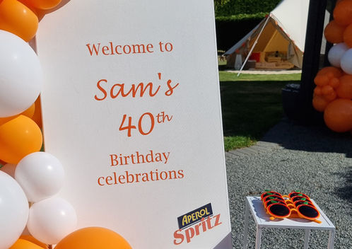 40th Birthday Aperol sprtz themed sign on an easel