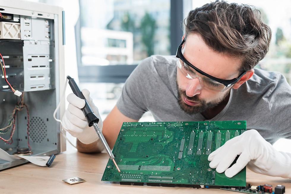 male-technician-repairing-computer-circuit-board.jpg