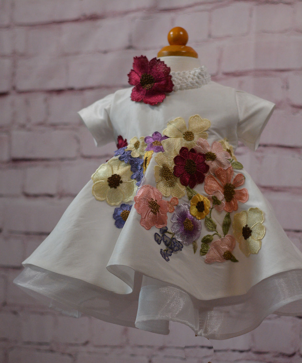 Thumbnail: An Olivia Inspirations dress adorned with colorful embroidered flowers with headband..