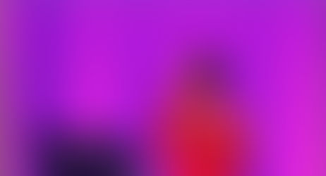 FILIPPA ROSE 𝝫 performing on stage with a red dress and purple hair