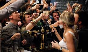 shouting your drink order in a bar