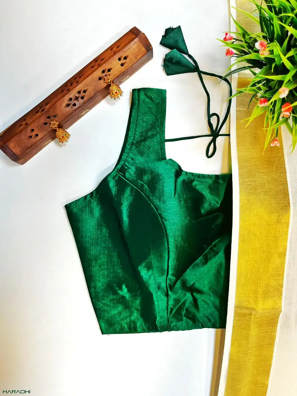 Thumbnail: Kerala saree with royal green readymade blouse closeup view